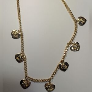 Wendy Gell Disney long heart necklace 28 in seven charms.